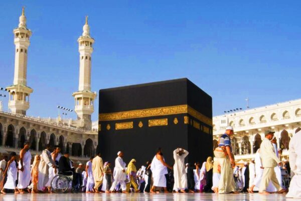 Pilgrims offering and enjoying umrah journey around kaaba